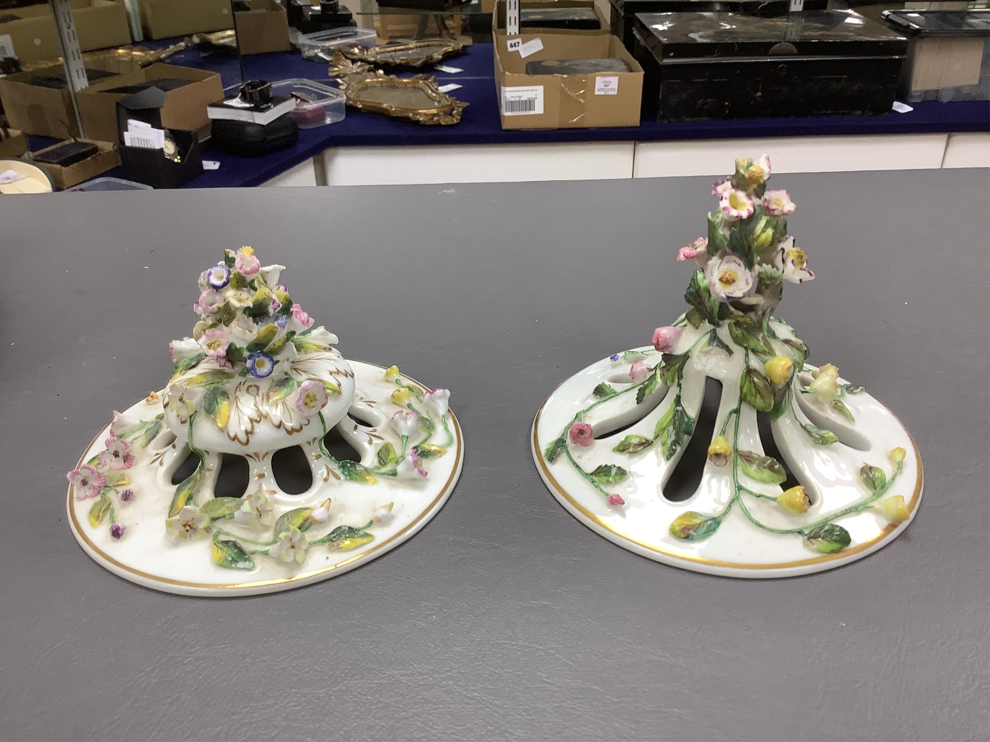 A pair of Rockingham two handled pot pourri vases and covers, c.1830-42, the first painted with two named views near Lyme, Dorsetshire and Stockly Bridge’, The second with an unnamed view of a monument by a lake, the rev